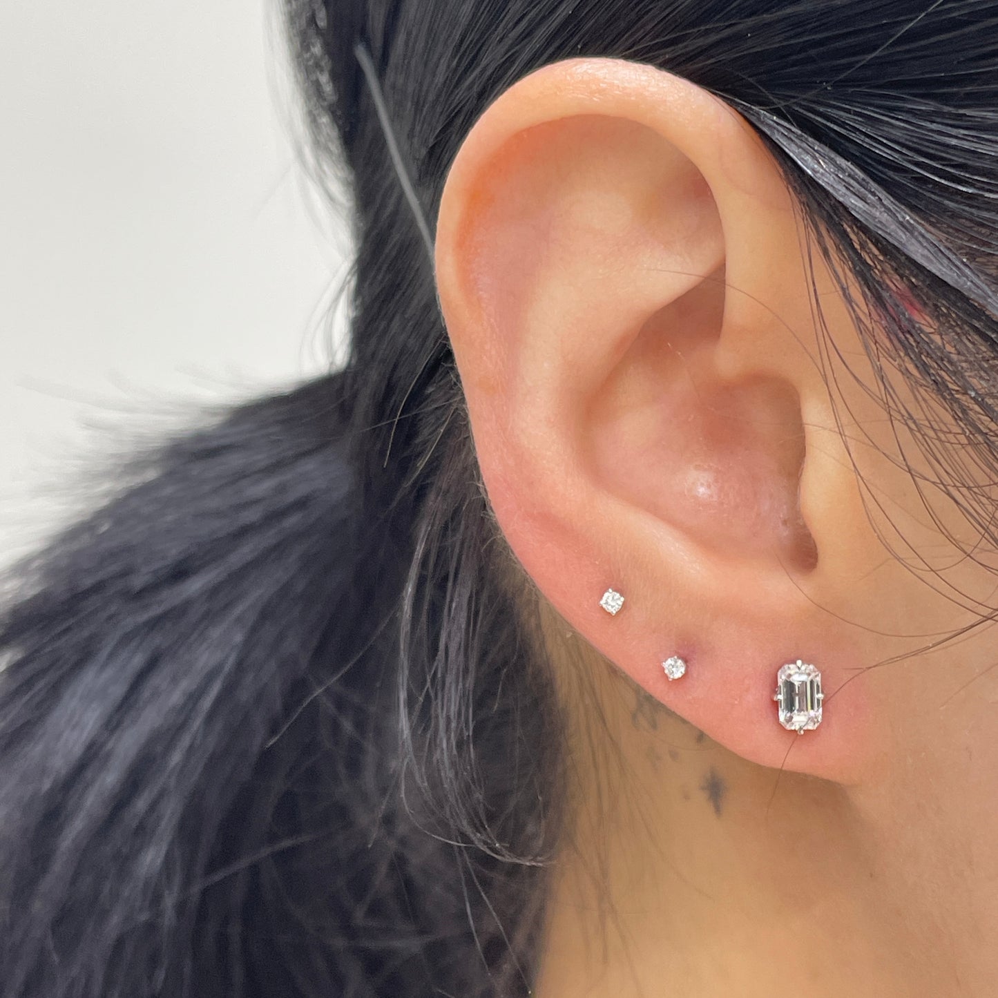 Lab diamond emerald cut 0.8ct four-prong compass stud earrings-pair