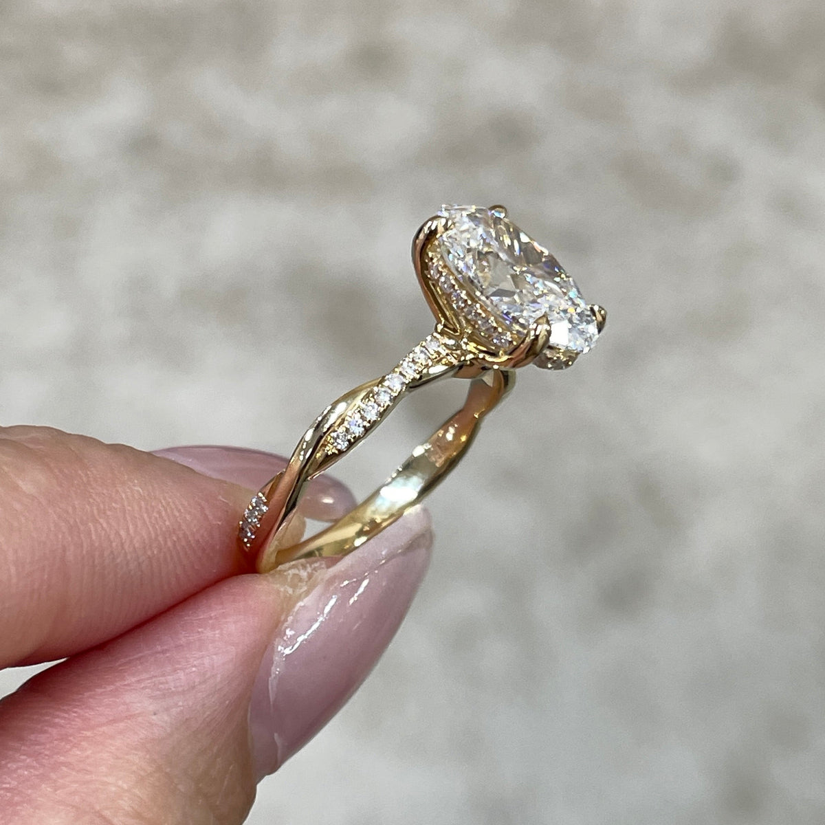 IGI Lab diamond Oval shape 2.5ct four-prong underhalo pave twisted band ring