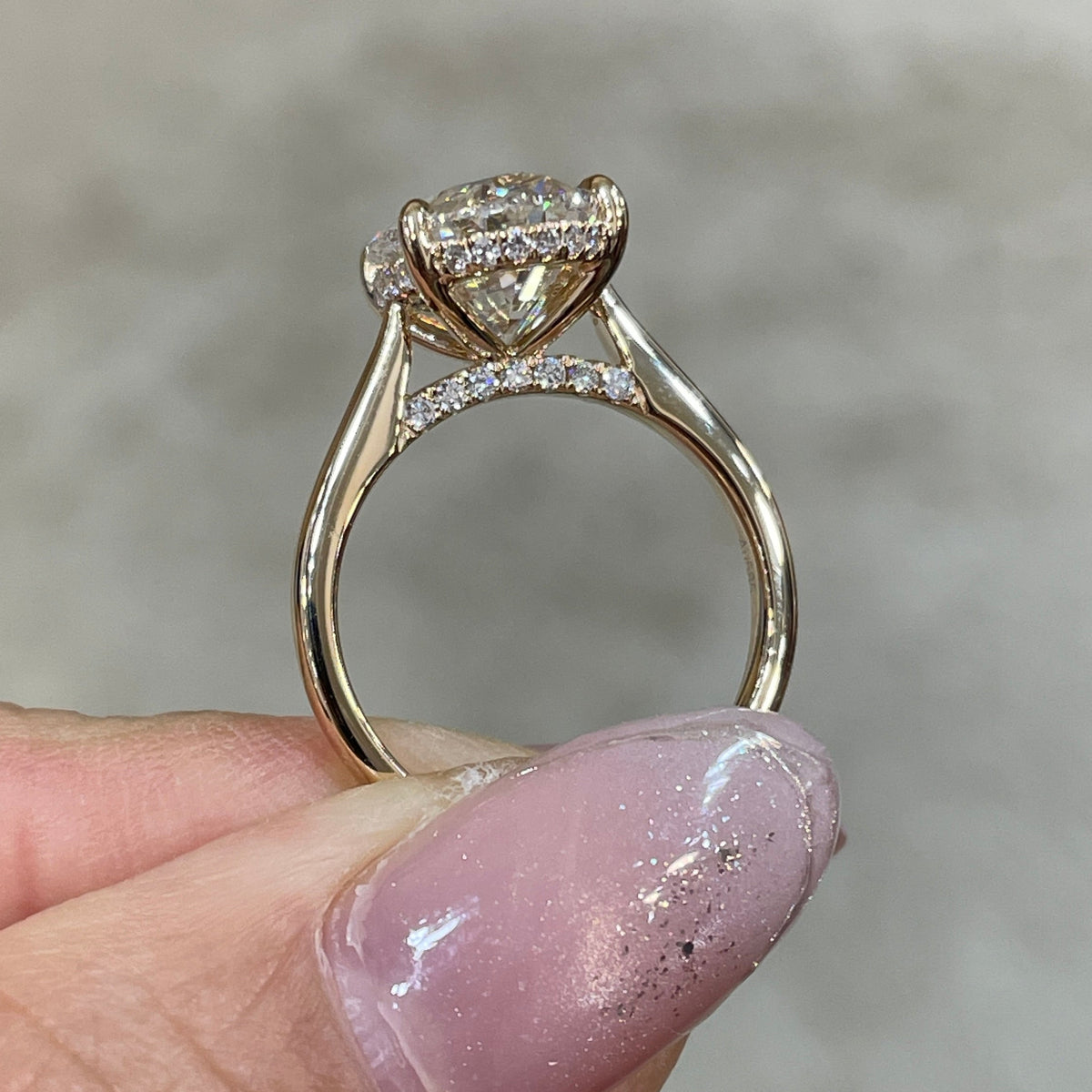 IGI Lab diamond Oval 3.5ct four-prong underhalo ring