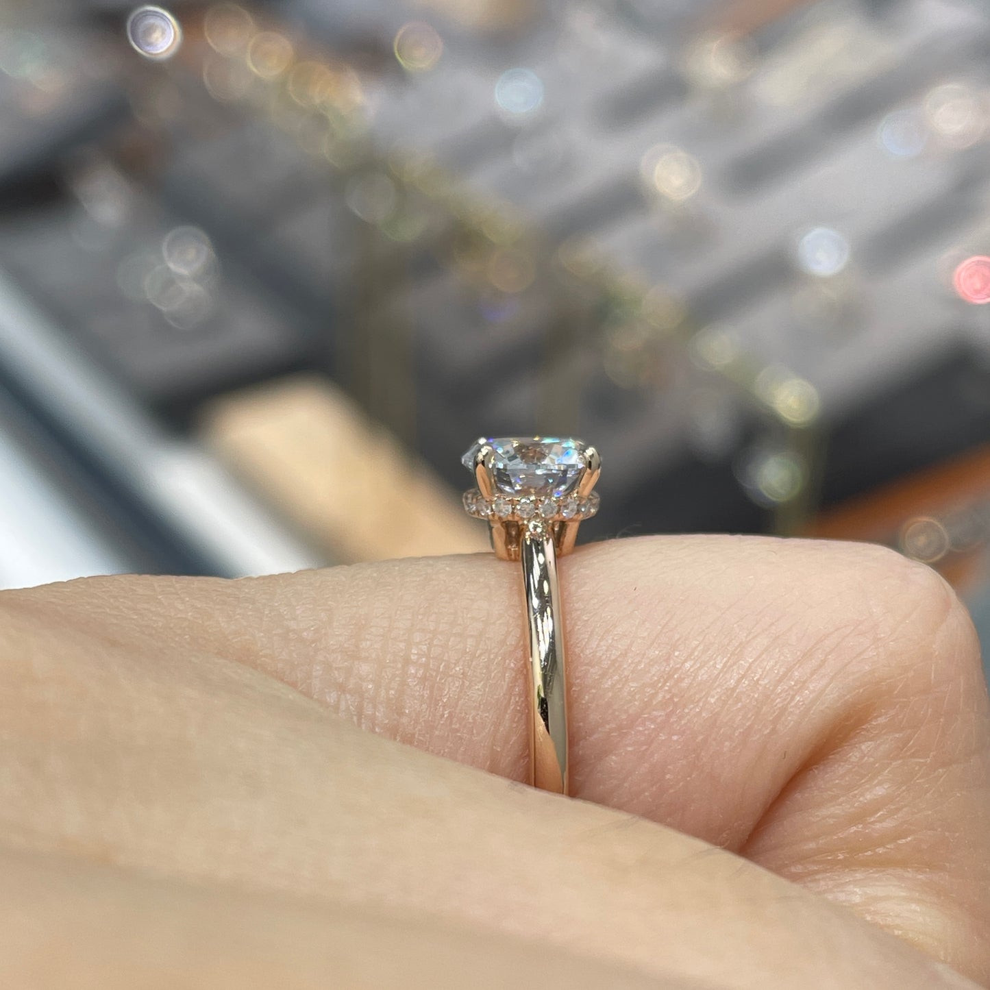 IGI lab diamond 1ct round four-prong underhalo ring