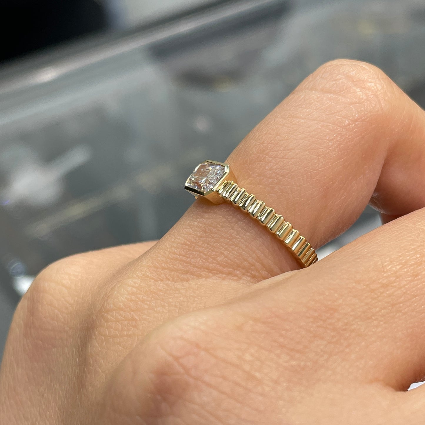 Lab diamond Radiant cut 0.6ct horizontal bezel set with vertical line band ring