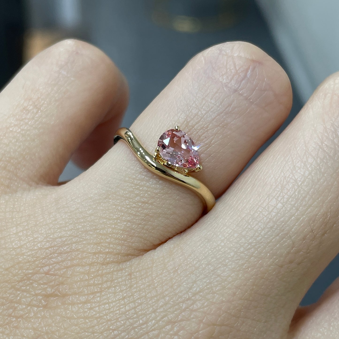 Lab pink sapphire pear shape 0.7ct wavy ring