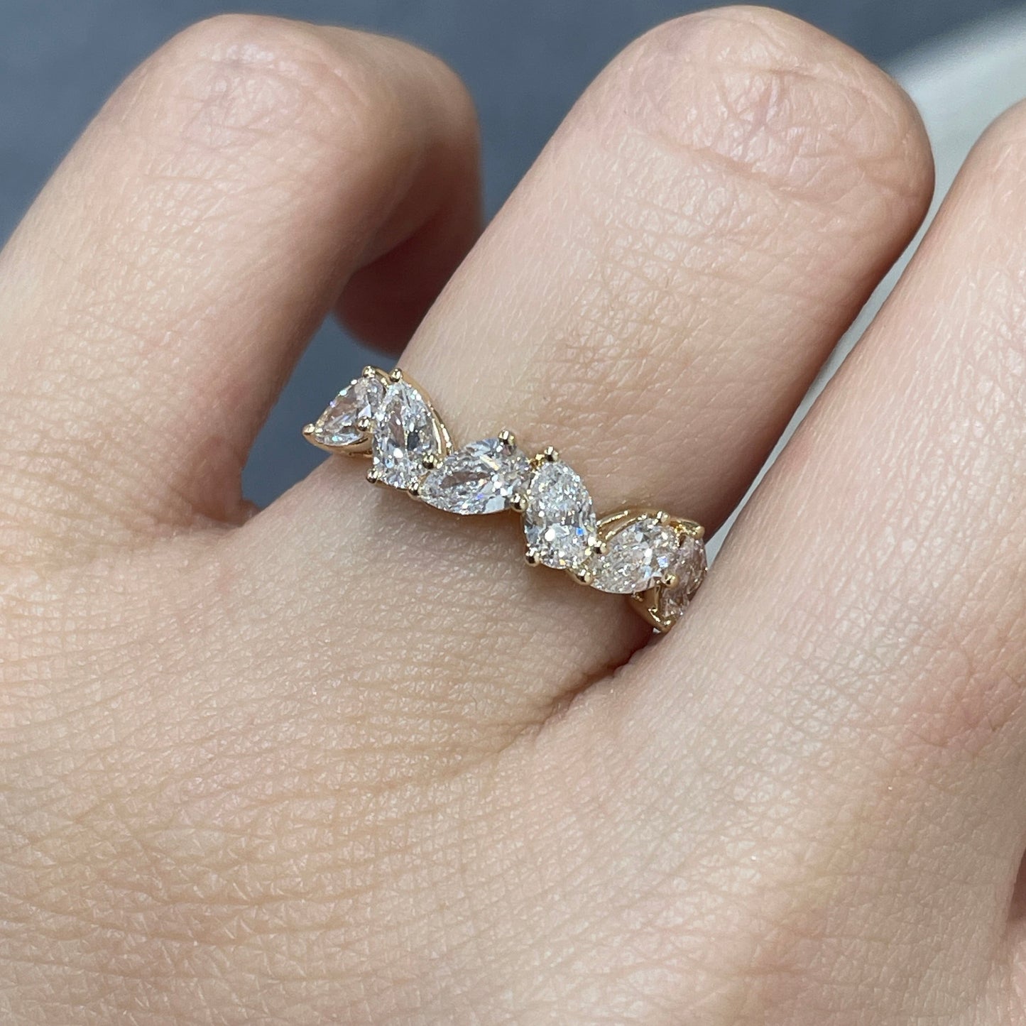Lab diamond pear 1.2ct irregular half eternity ring
