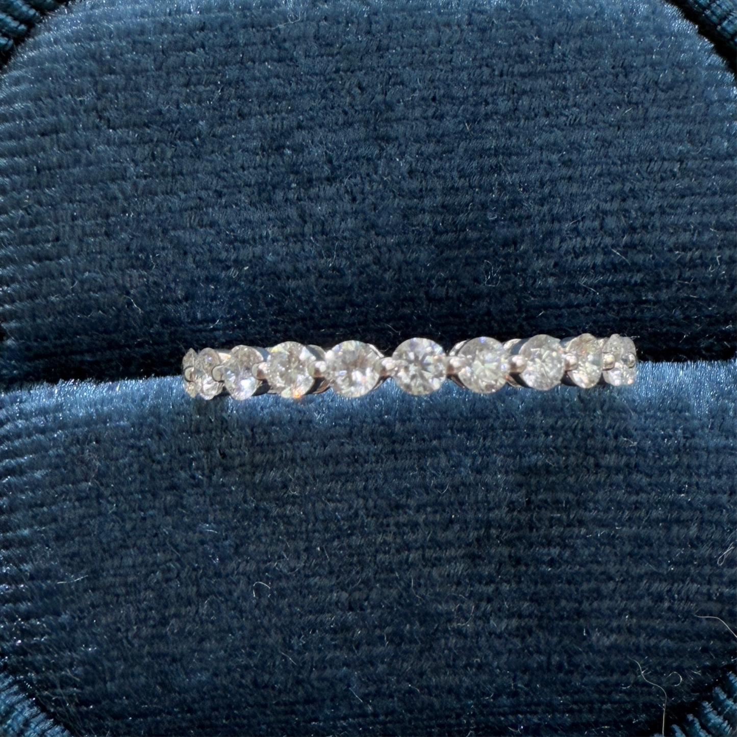 Lab diamond round 0.6ct single prong half eternity ring