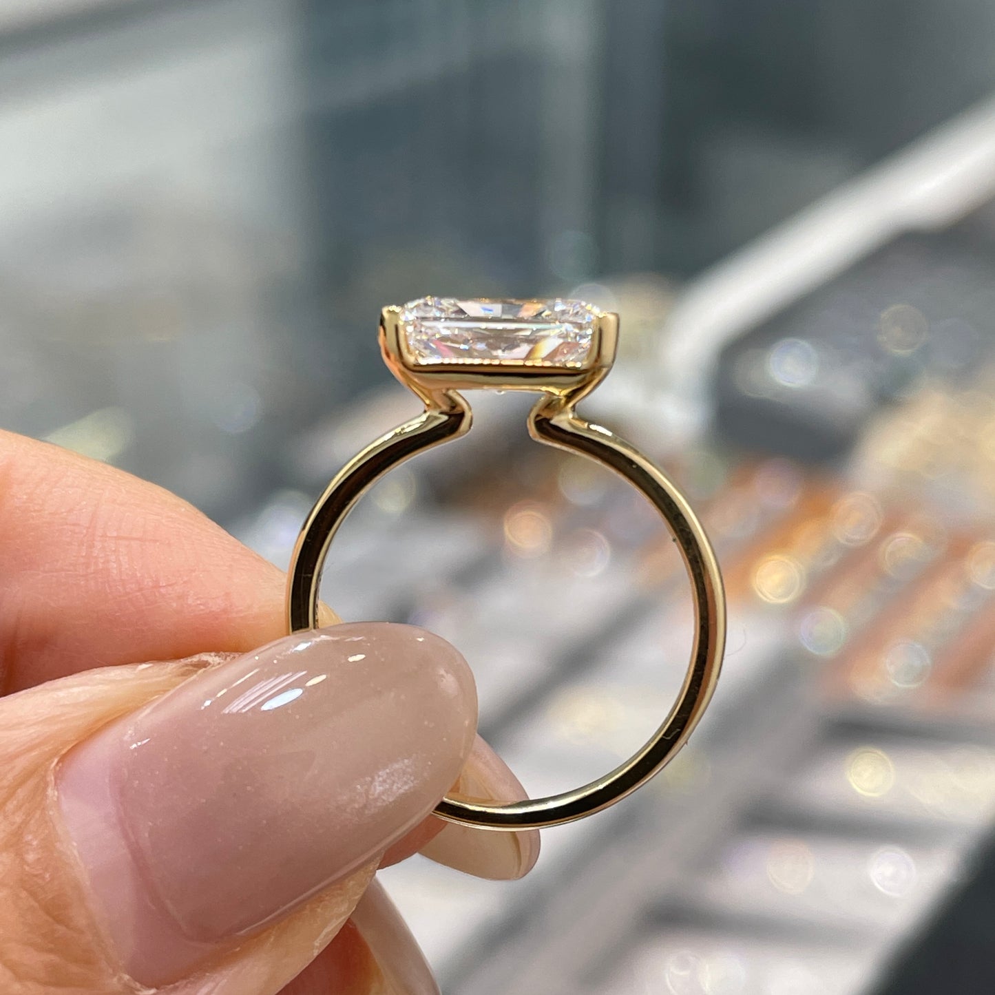 IGI lab diamond Radiant cut 1.8ct half bezel east west ring