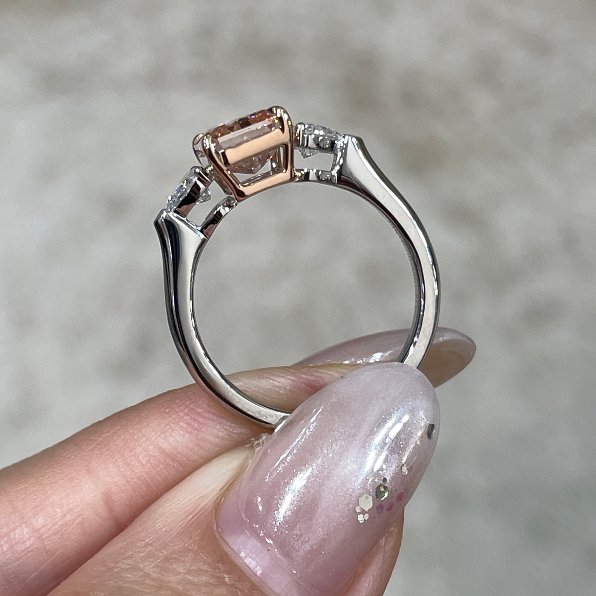 IGI pink diamond radiant 2ct with heart 0.5ct three stone setting two tone ring