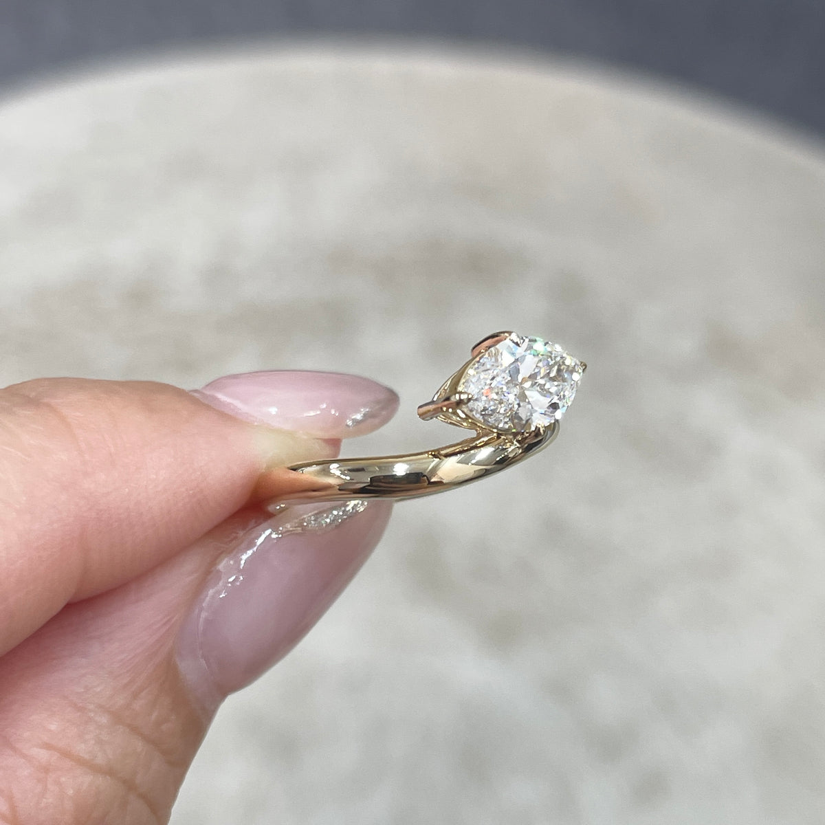 9k IGI Lab diamond marquise shape 1.2ct compass four-prong wavy ring