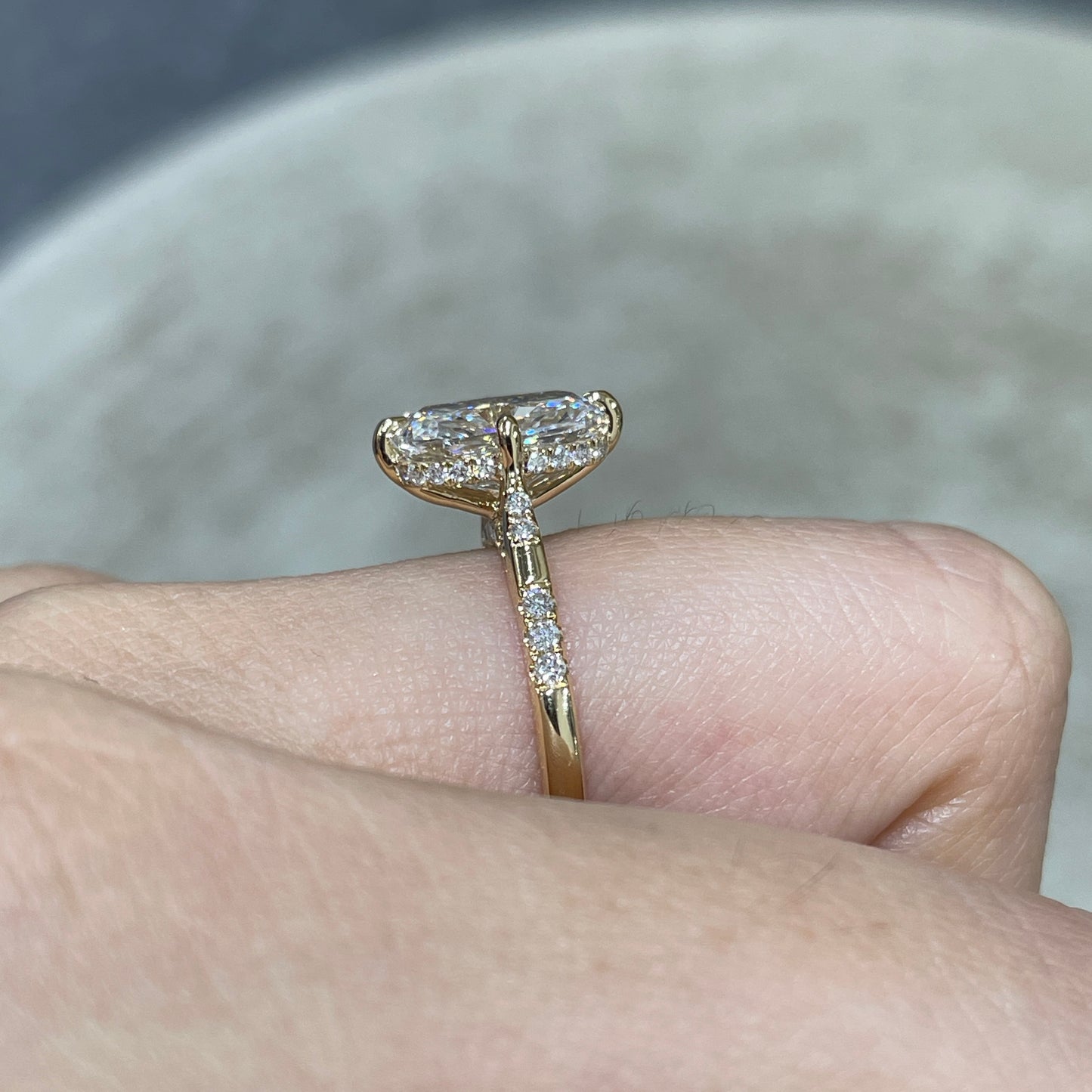 IGI Lab diamond long cushion cut 2.5ct four-prong compass underhalo side stone ring