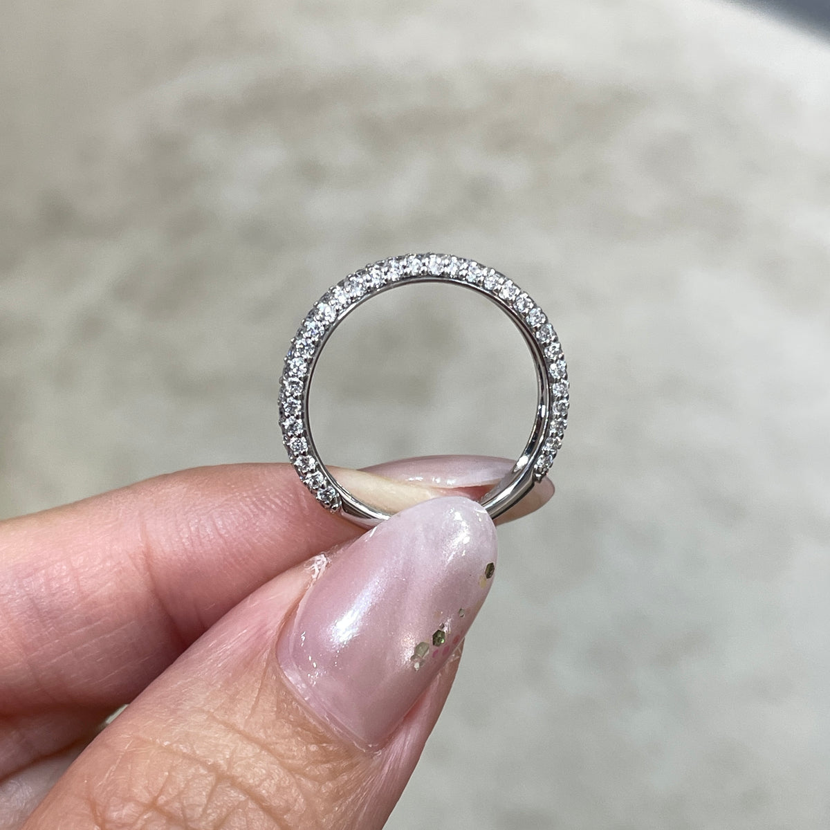 9k Lab diamond round 0.6ct three row ¾ coverage ring