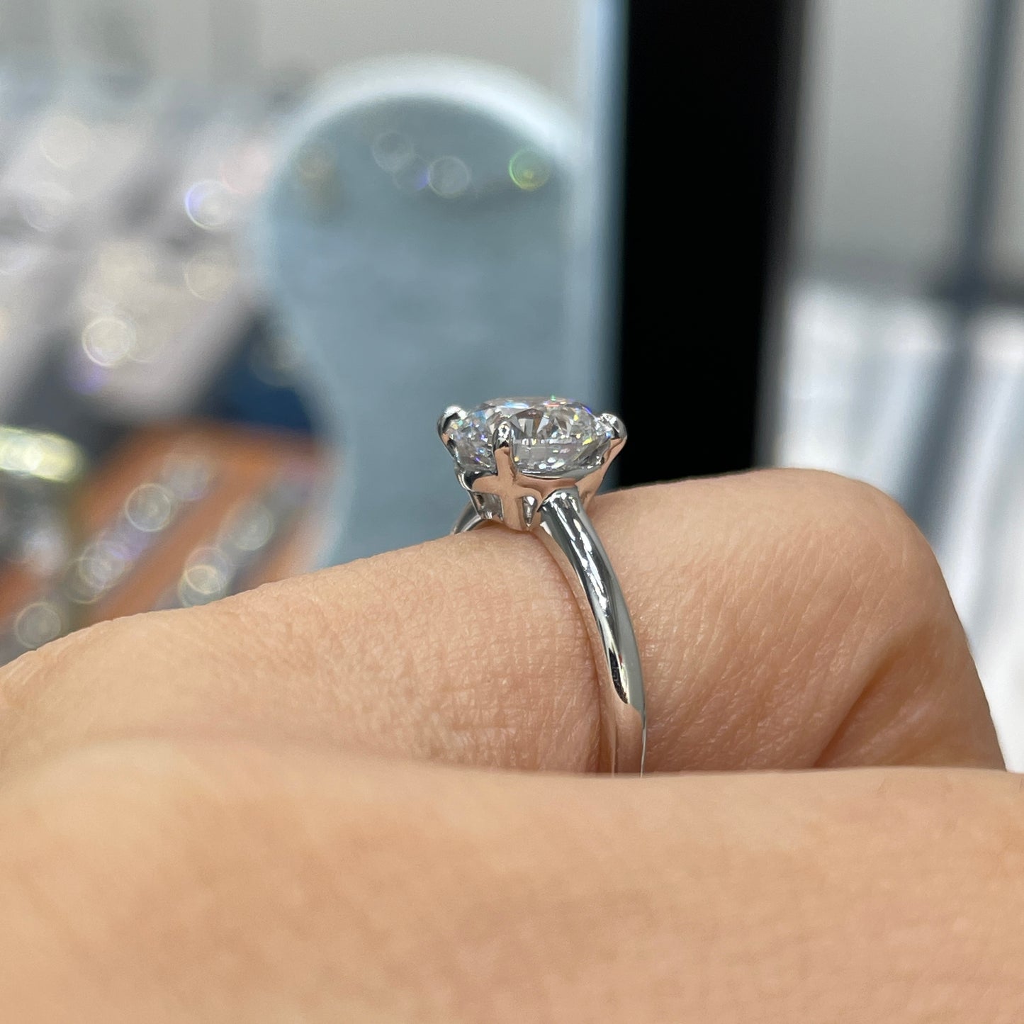 IGI lab diamond round 1.5ct four-prong low setting solitaire ring