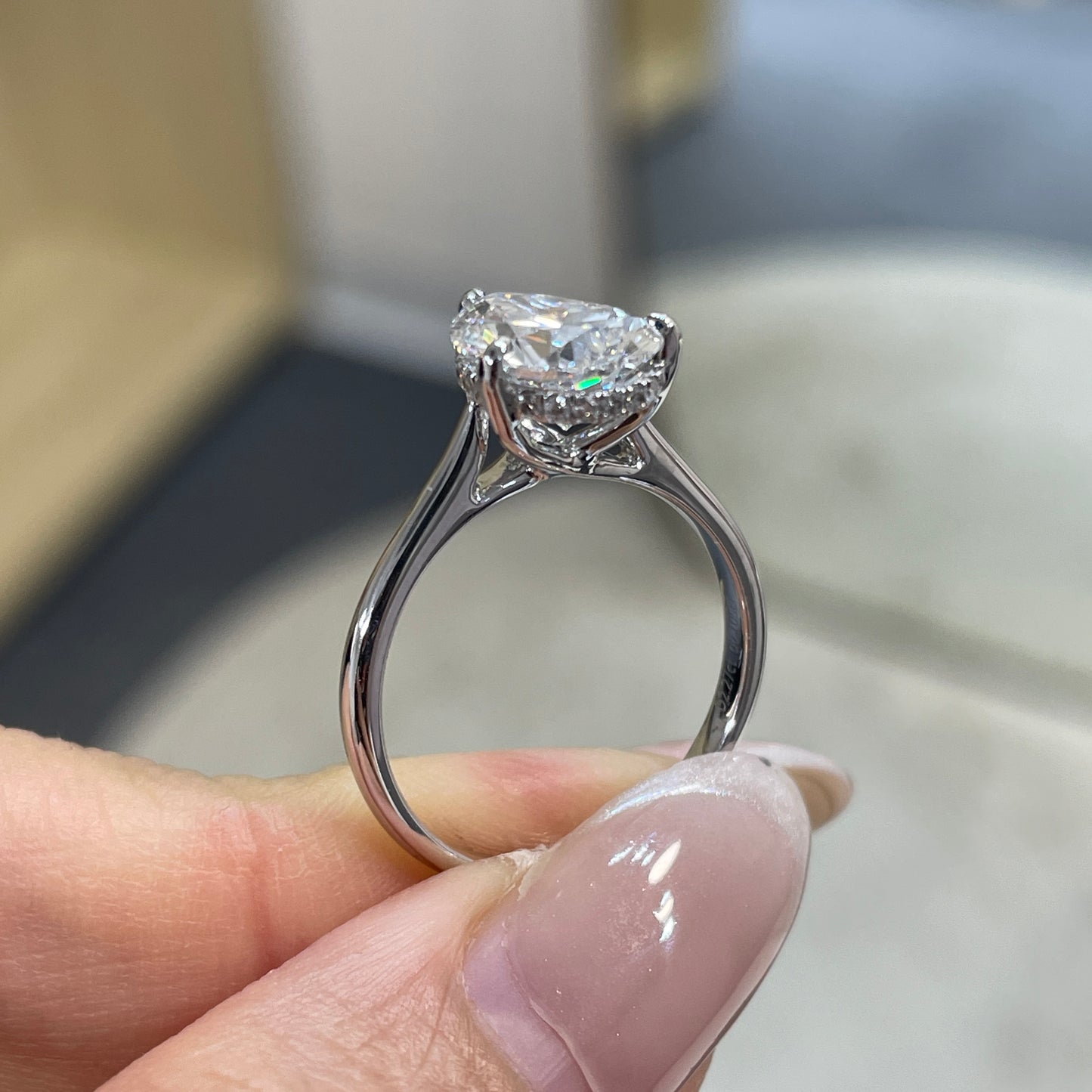 IGI Lab diamond pear shape 2.27ct three-prong underhalo ring