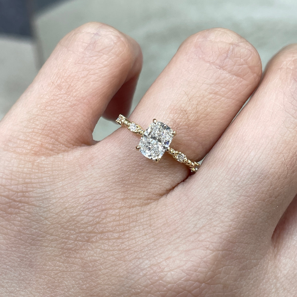IGI Lab Diamond long cushion 1ct four-prong side stone with milgrain band ring