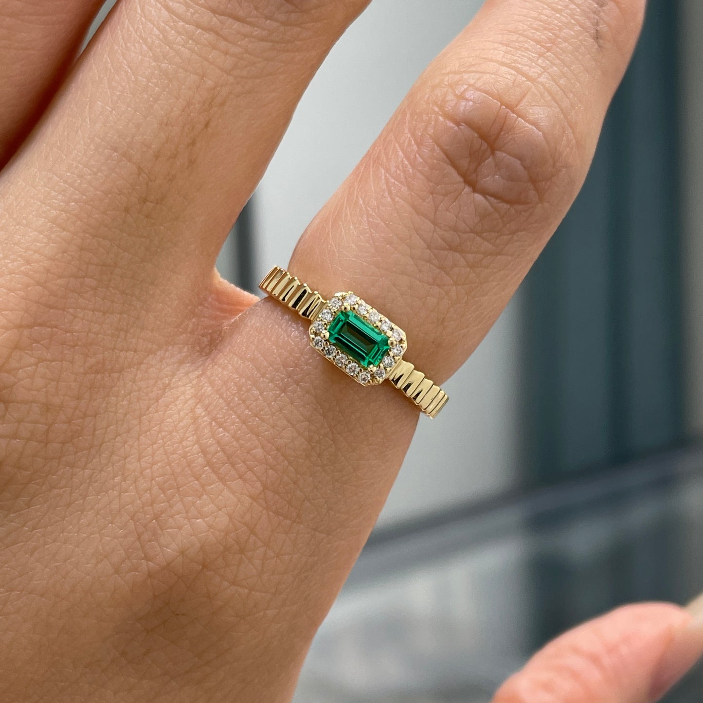 Lab Emerald emerald cut 0.25ct halo set with vertical line band ring