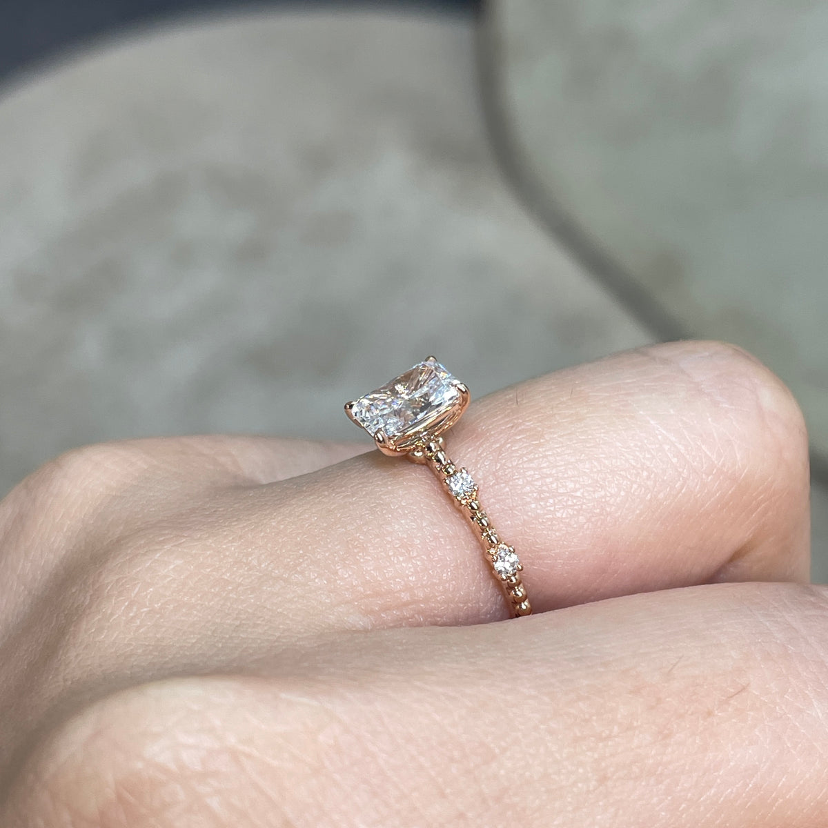 Lab Diamond radiant cut 1ct four-prong side stone with milgrain band ring