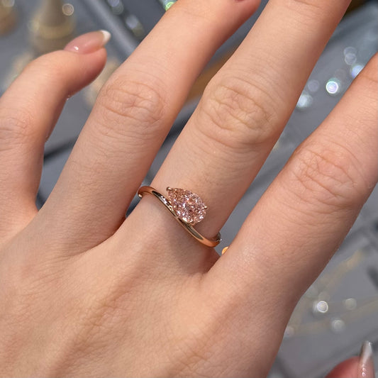 IGI lab pink diamind pear shape 1ct three-prong wavy ring