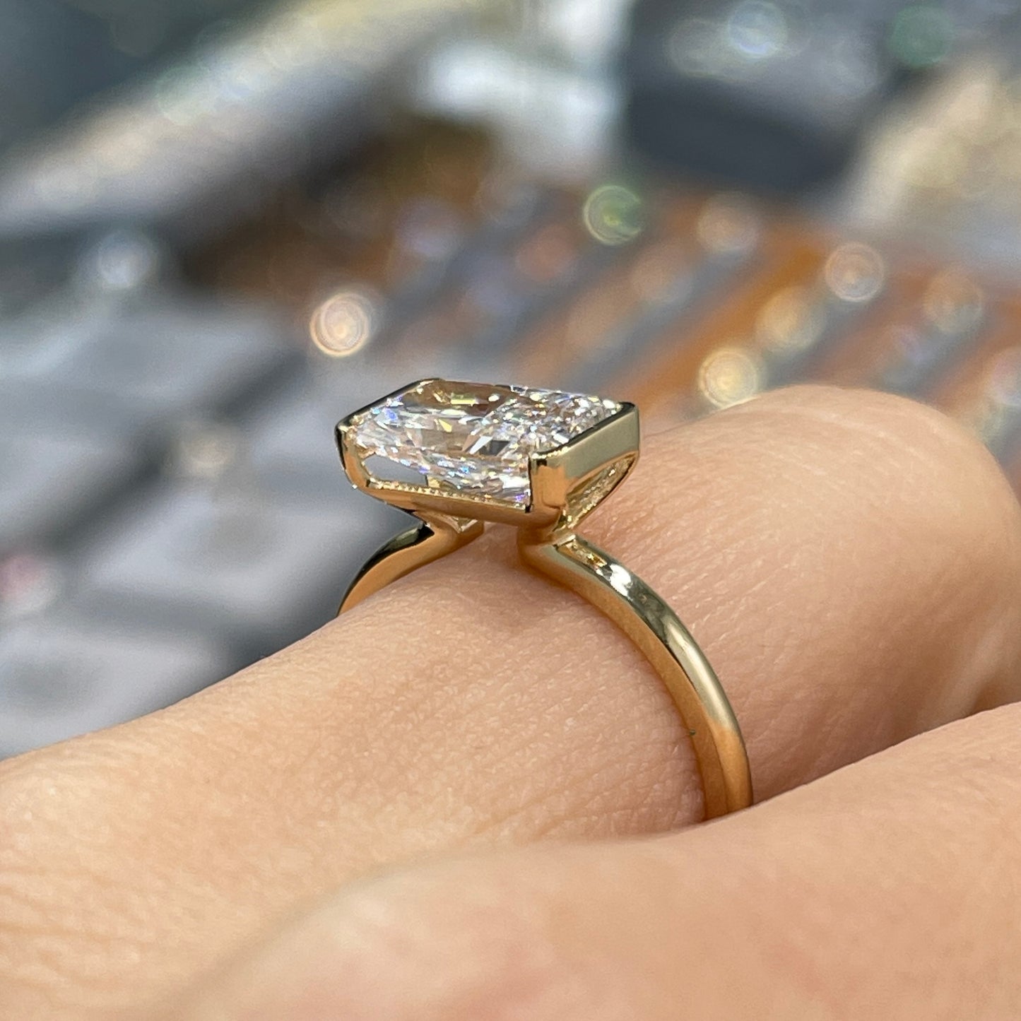 IGI lab diamond Radiant cut 1.8ct half bezel east west ring