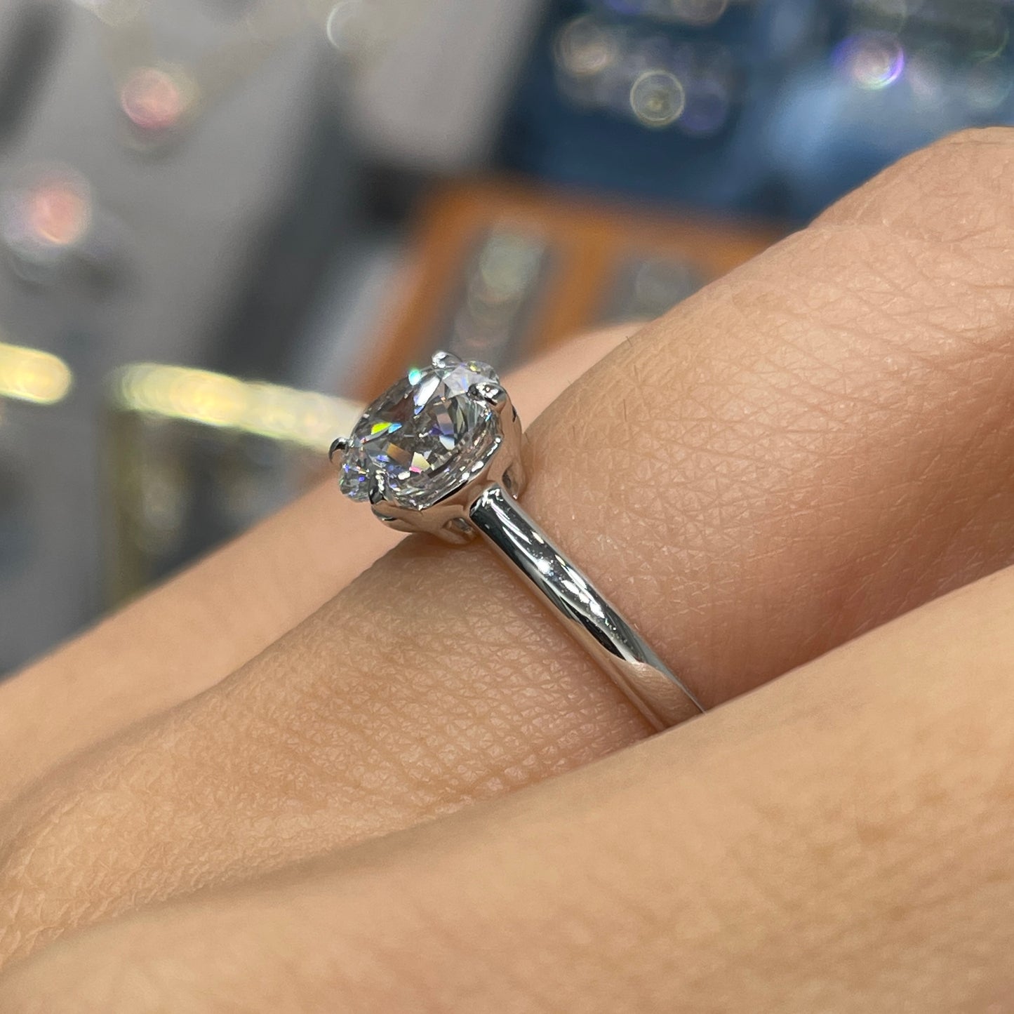 IGI lab diamond round 1.5ct four-prong low setting solitaire ring