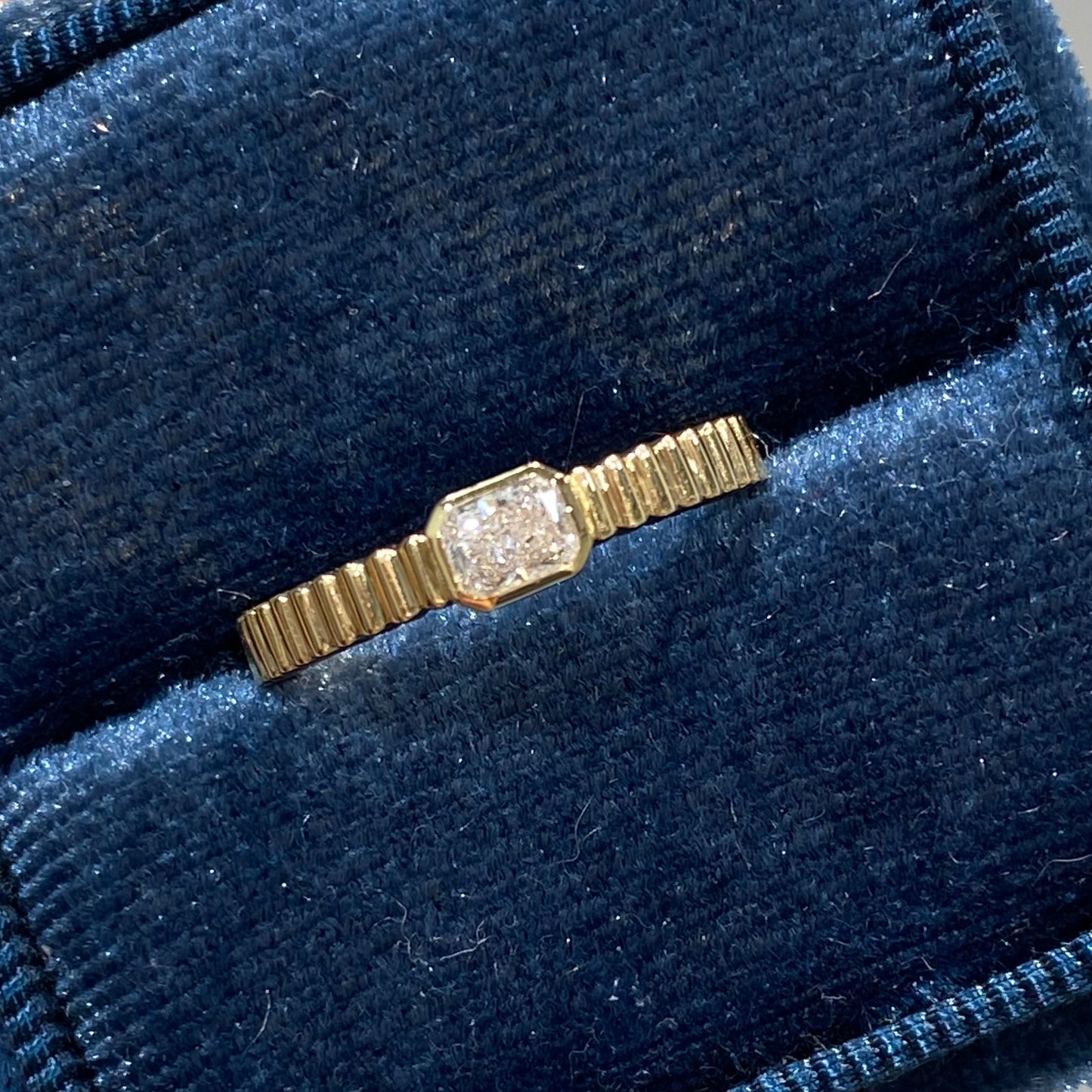 Lab diamond radiant cut 0.2ct horizontal bezel set with vertical line band ring