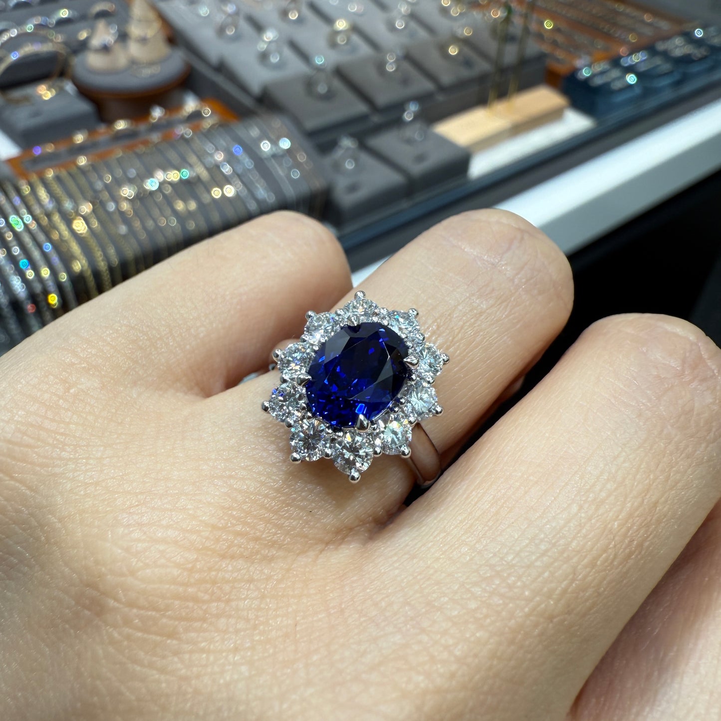 Lab grown Sapphire royal blue Oval 2.5ct halo ring