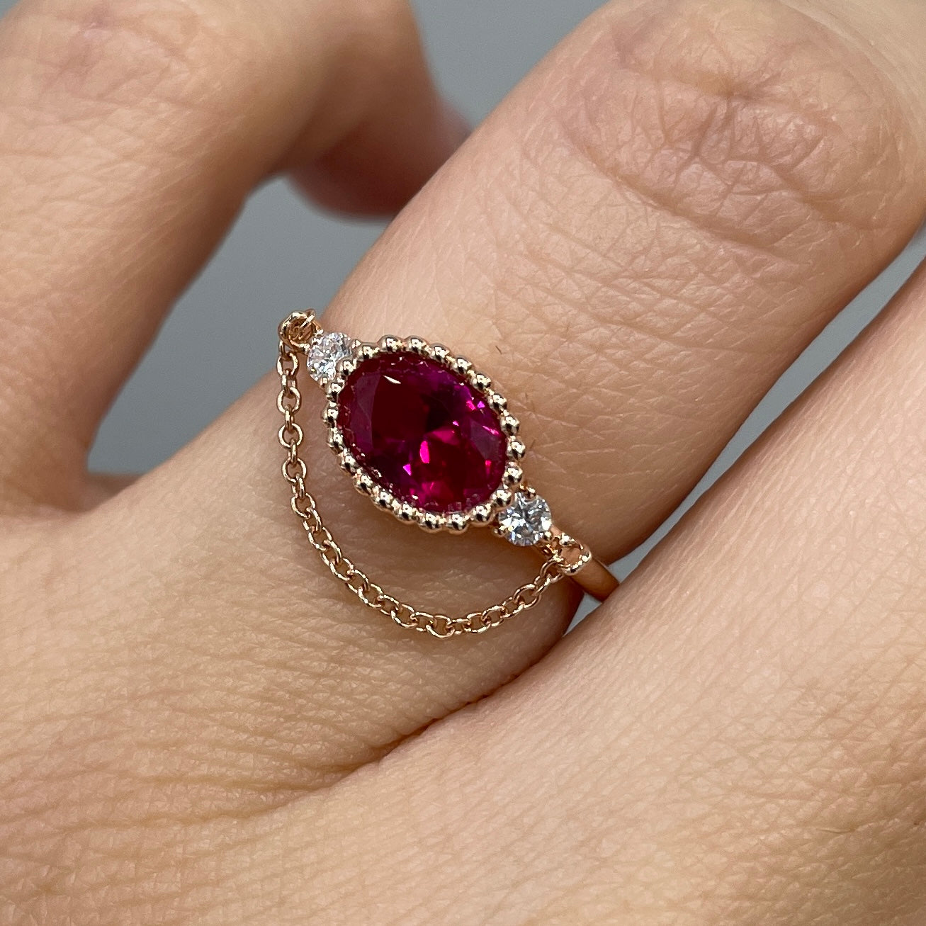 Lab Ruby Oval shape 0.8ct with diamond milgrain bezel chain ring