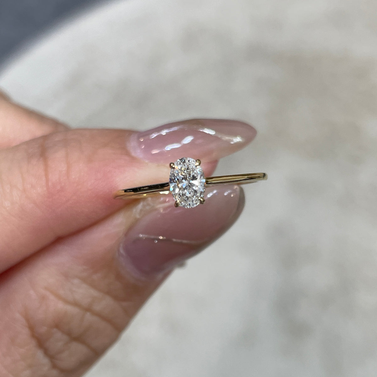Lab diamond oval shape 0.3ct four-prong solitaire ring