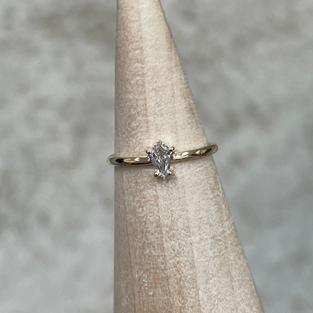 9k Lad diamond shield cut 0.15ct solitaire pinky ring