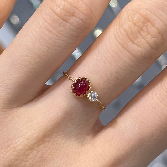 Lab Ruby oval 0.5ct with round little diamond
