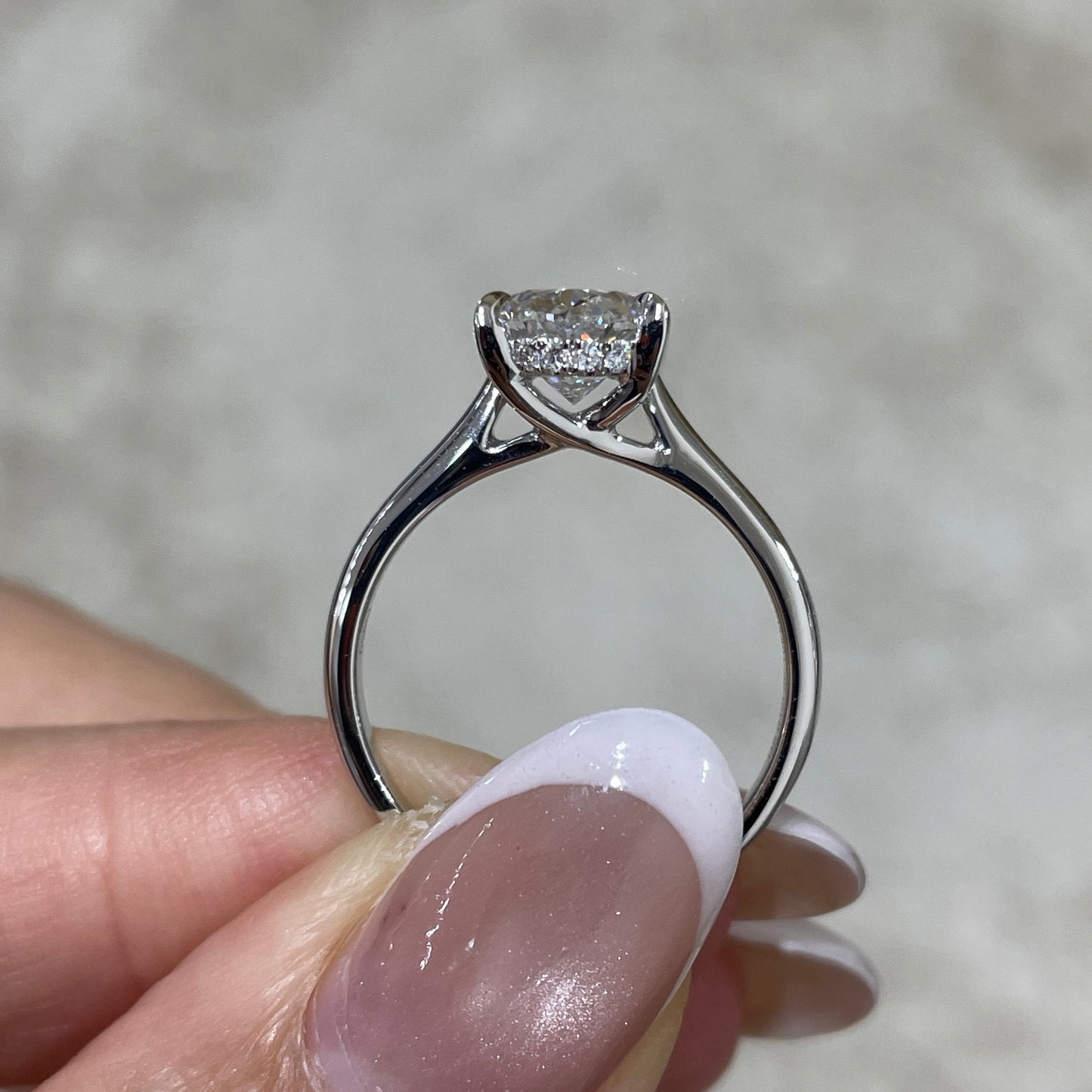 IGI Lab diamond Oval shape 2ct four-prong under halo ring