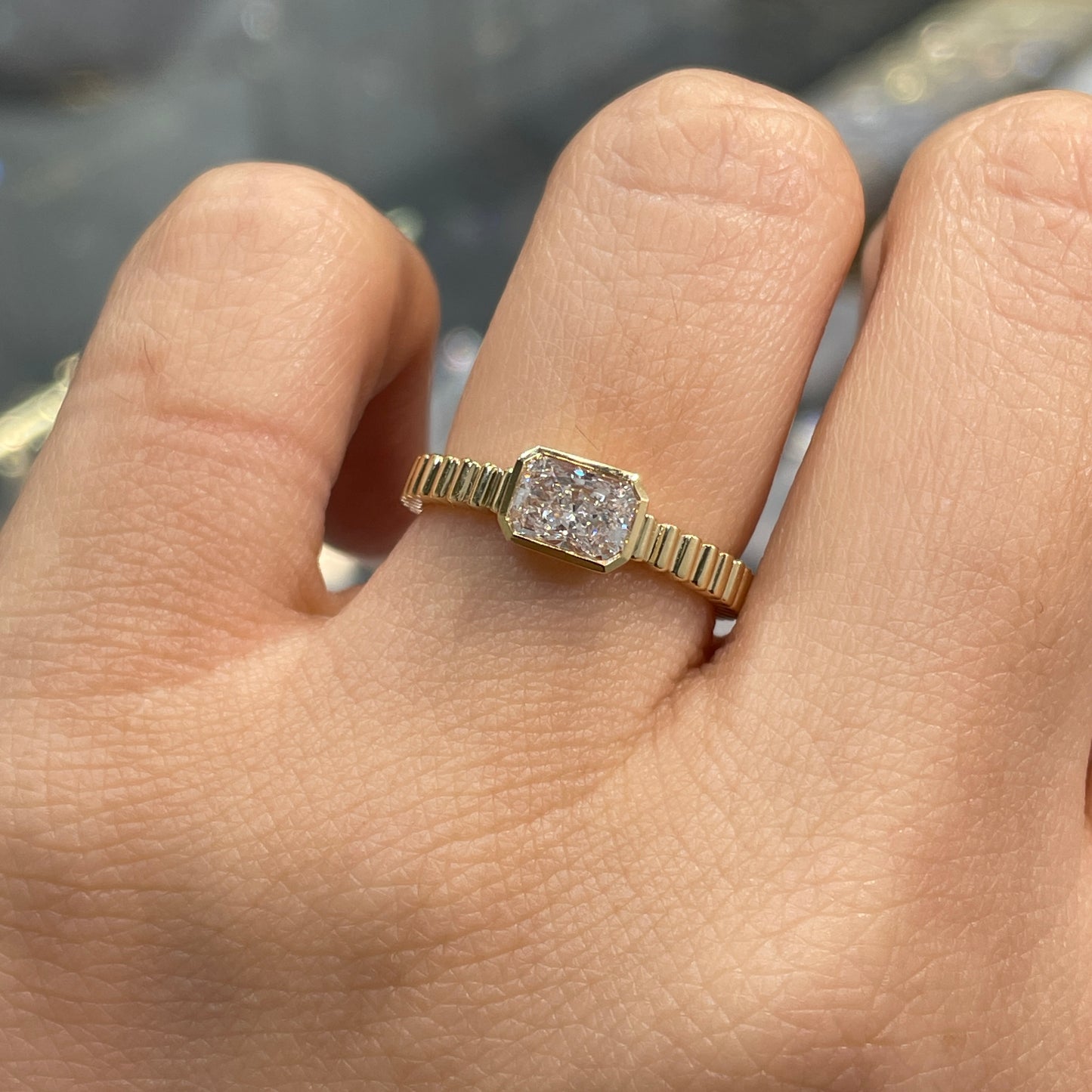 Lab diamond Radiant cut 0.6ct horizontal bezel set with vertical line band ring
