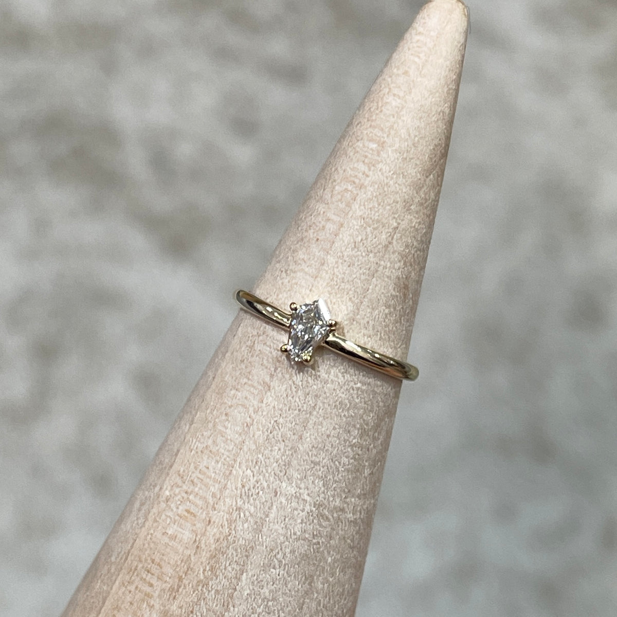9k Lad diamond shield cut 0.15ct solitaire pinky ring