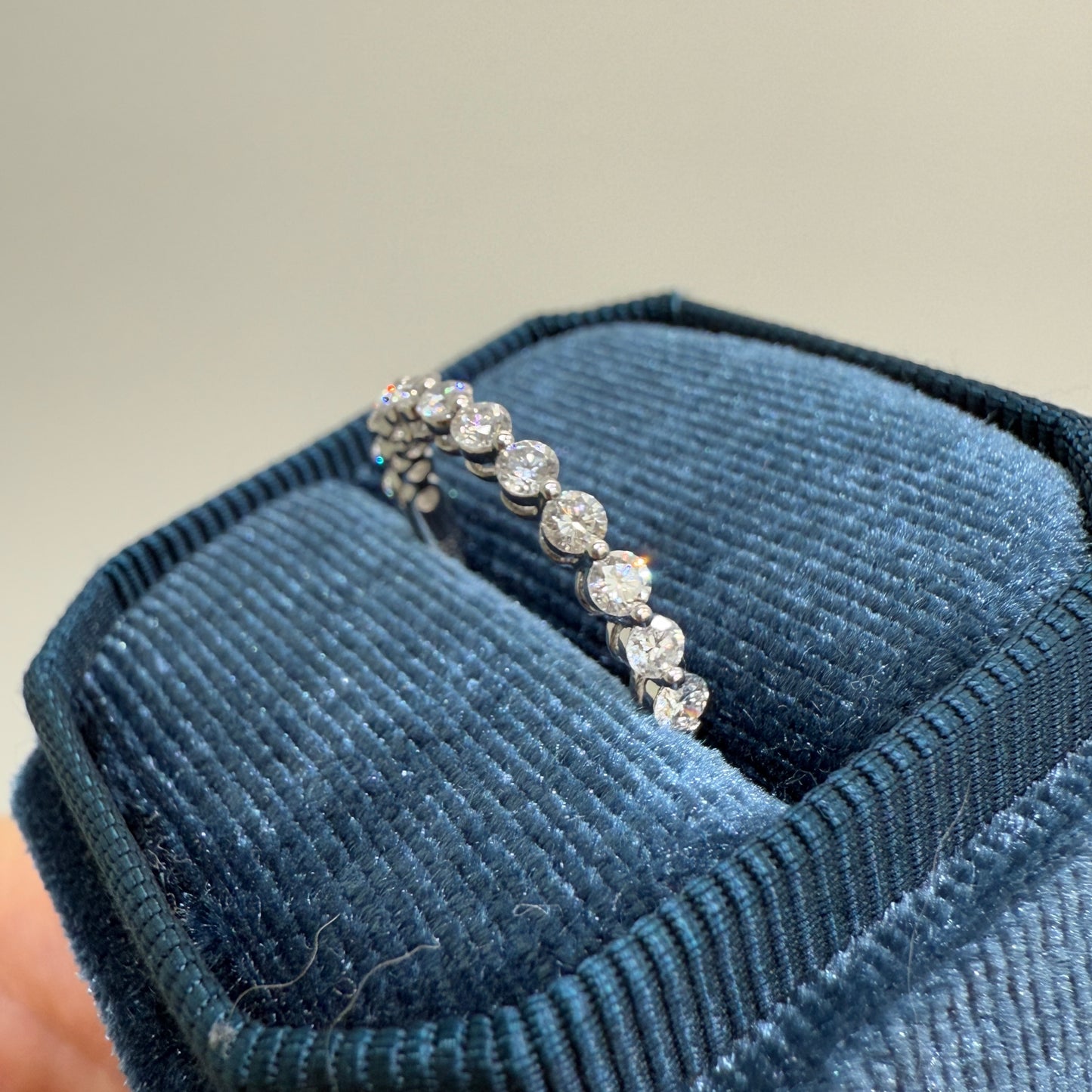 Lab diamond round 0.6ct single prong half eternity ring