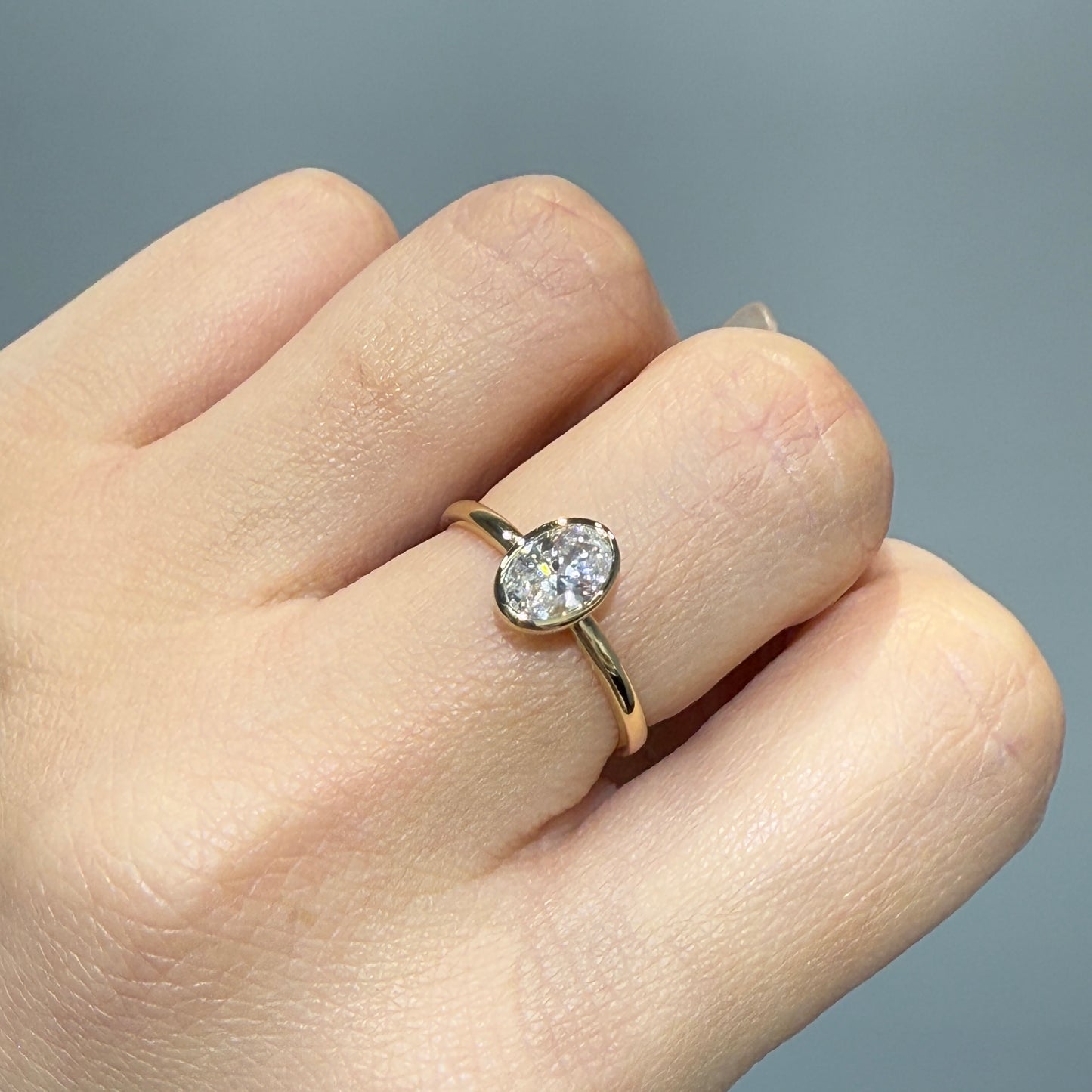Lab diamond oval 0.7ct bezel ring