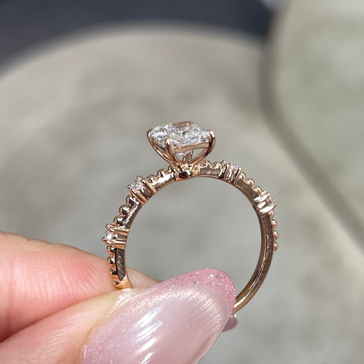 Lab Diamond radiant cut 1ct four-prong side stone with milgrain band ring