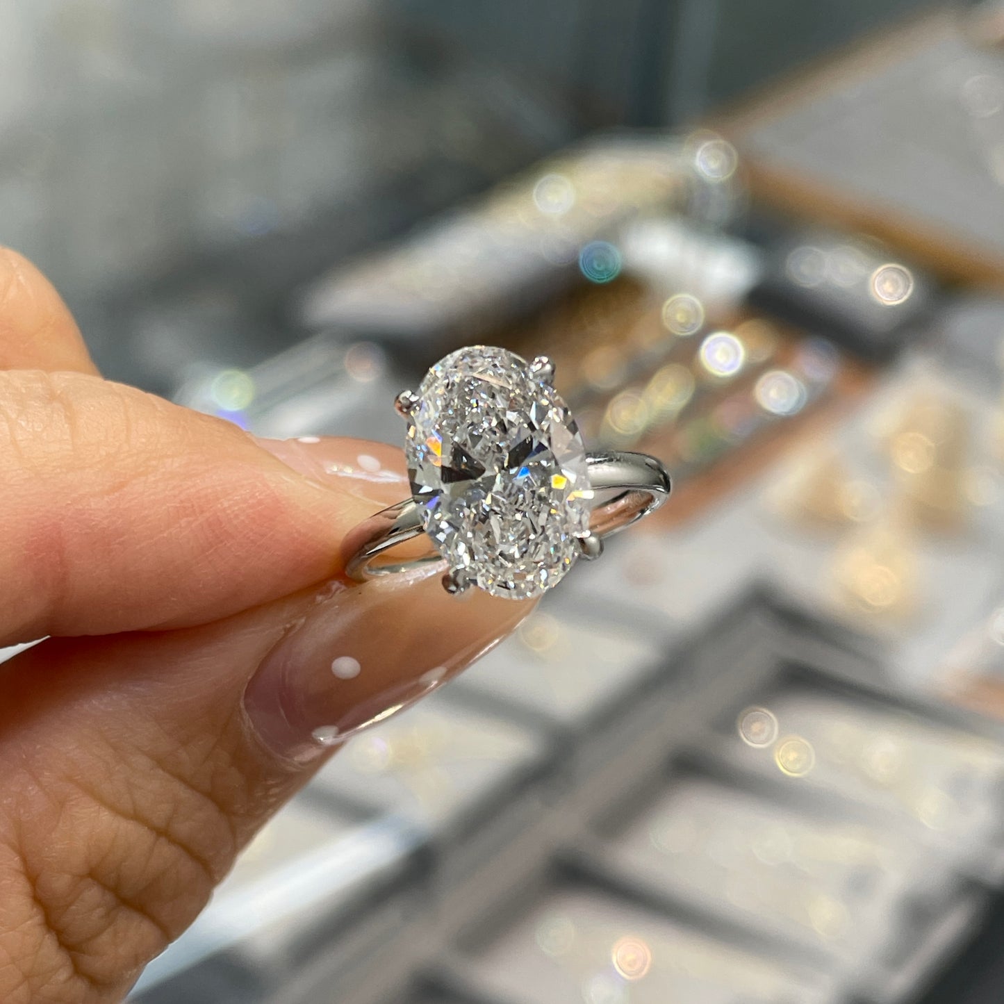 IGI lab diamond Oval 3.5ct four-prong underhalo ring