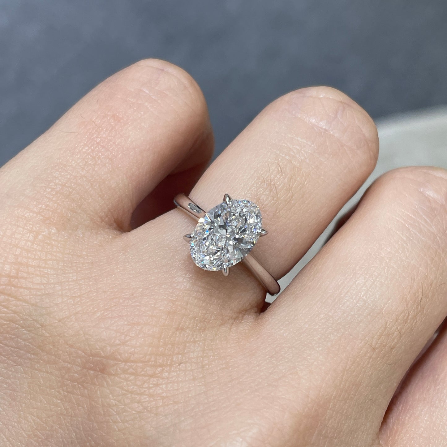 IGI Lab diamond Oval shape 2ct four-prong under halo ring