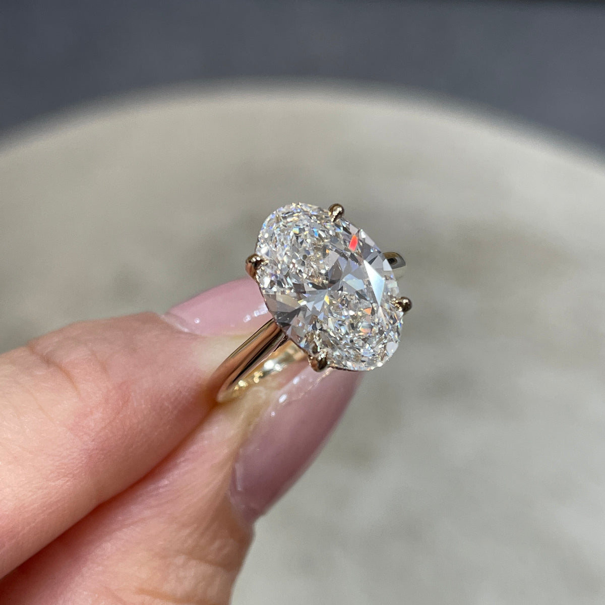 IGI Lab diamond Oval 3.5ct four-prong underhalo ring