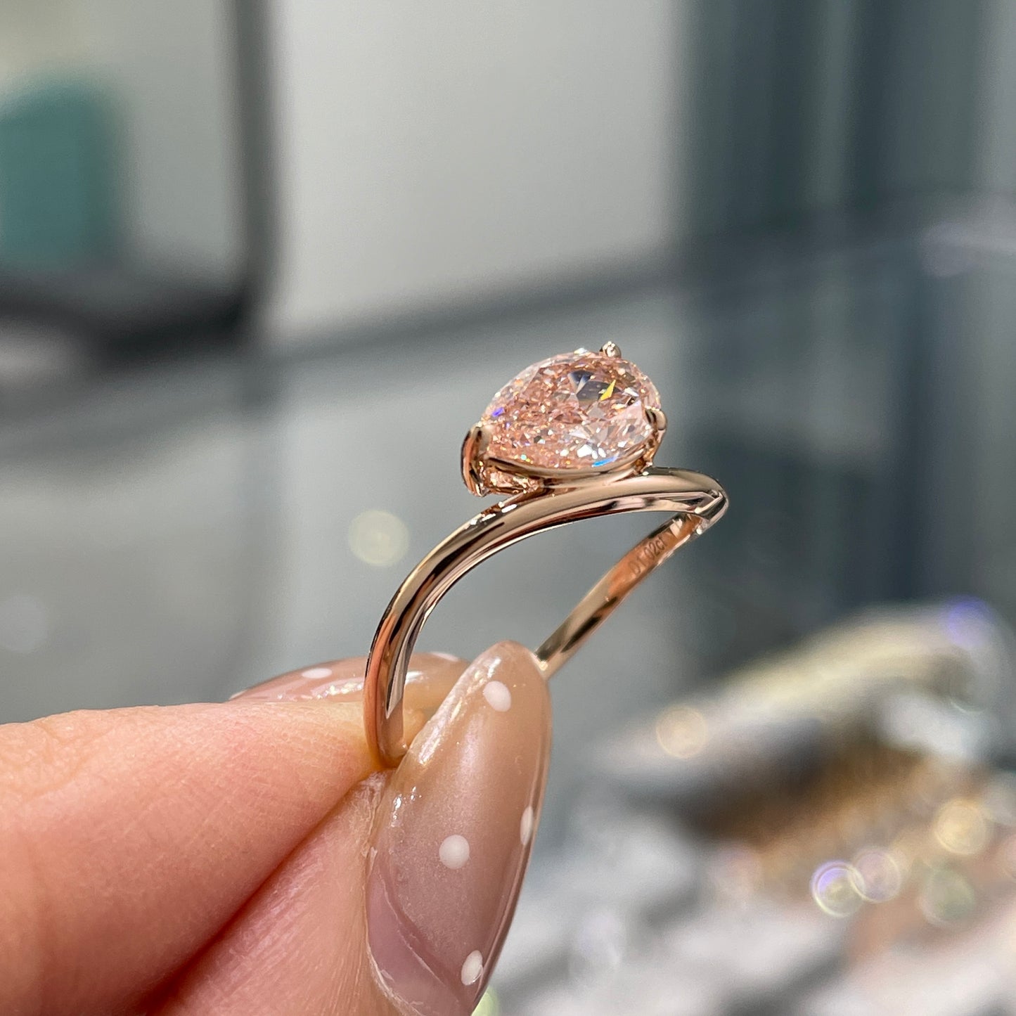 IGI lab pink diamind pear shape 1ct three-prong wavy ring