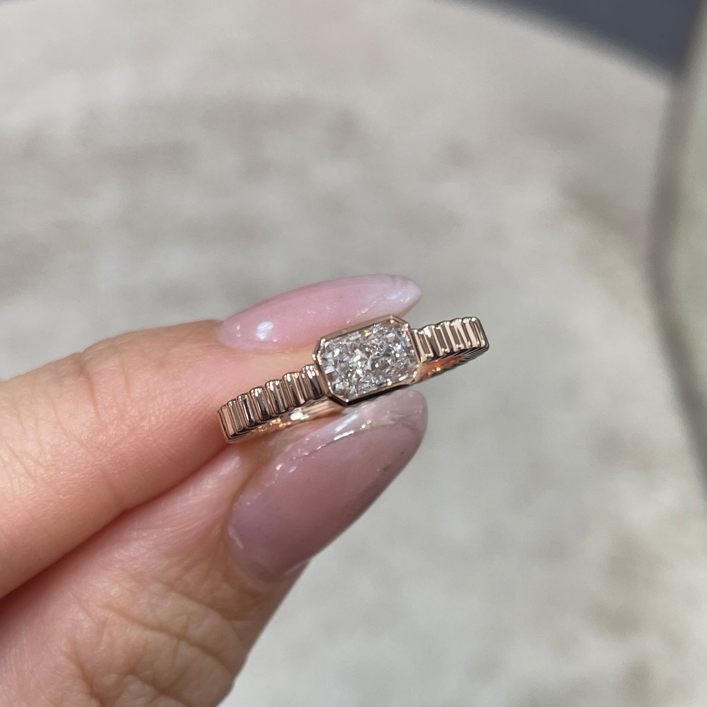 9k Lab diamond Radiant cut 0.6ct horizontal bezel set with vertical line band ring