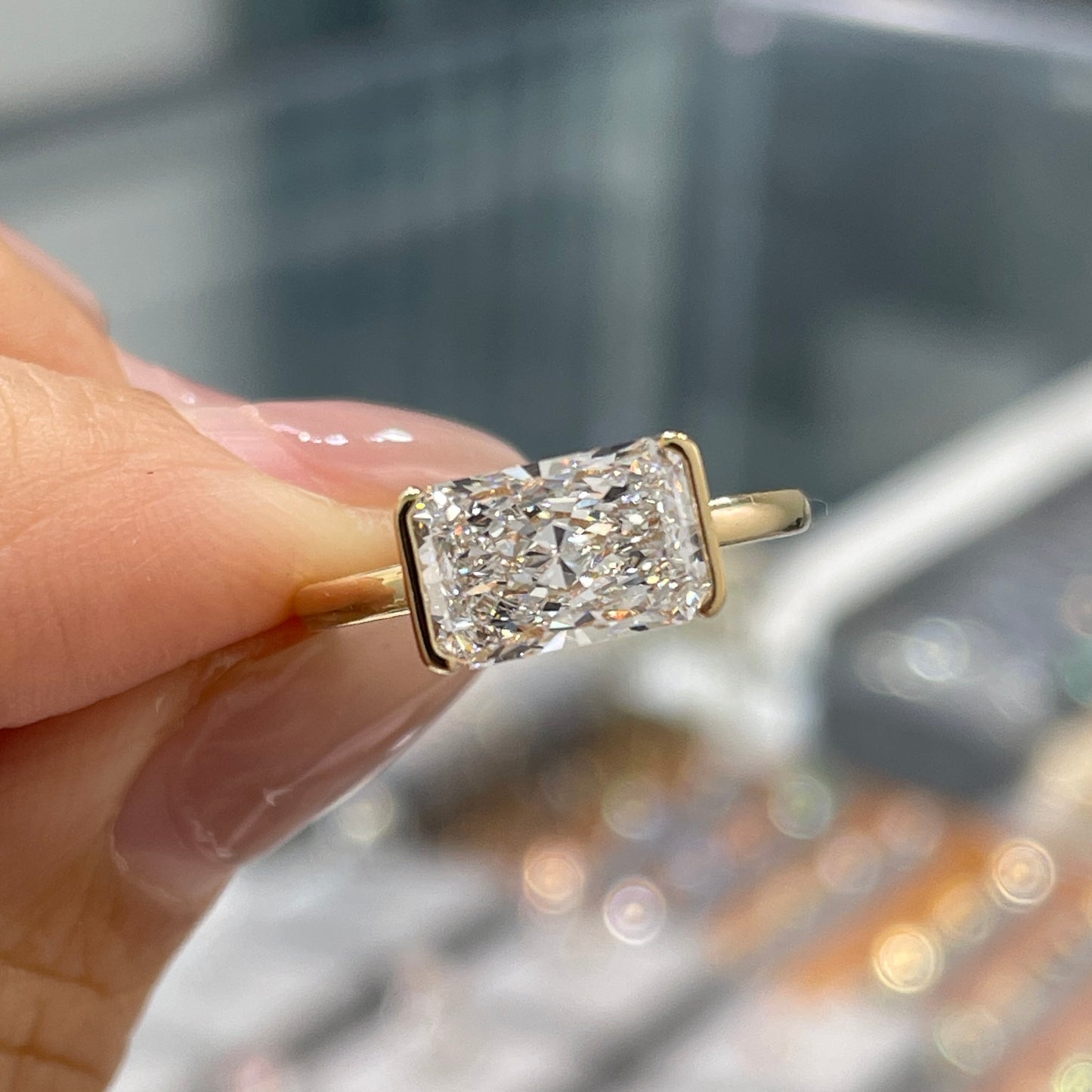 IGI lab diamond Radiant cut 1.8ct half bezel east west ring