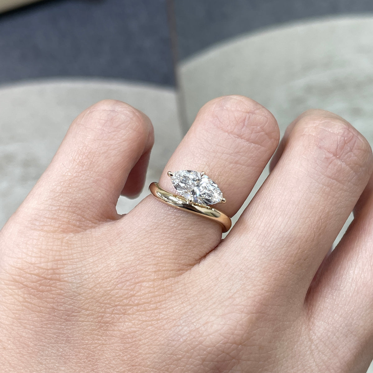 9k IGI Lab diamond marquise shape 1.35ct compass four-prong wavy ring