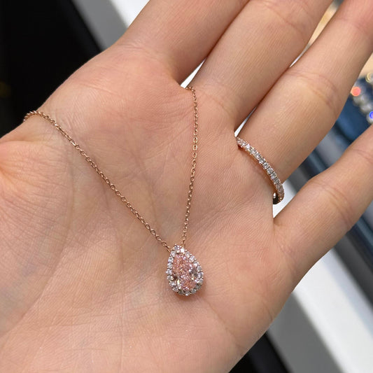 IGI Lab pink diamond Pear shape 0.9ct two way halo pave ring