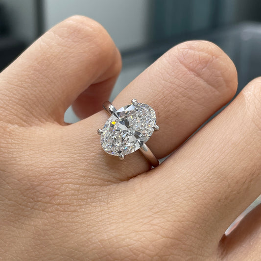 IGI lab diamond Oval 3.5ct four-prong underhalo ring