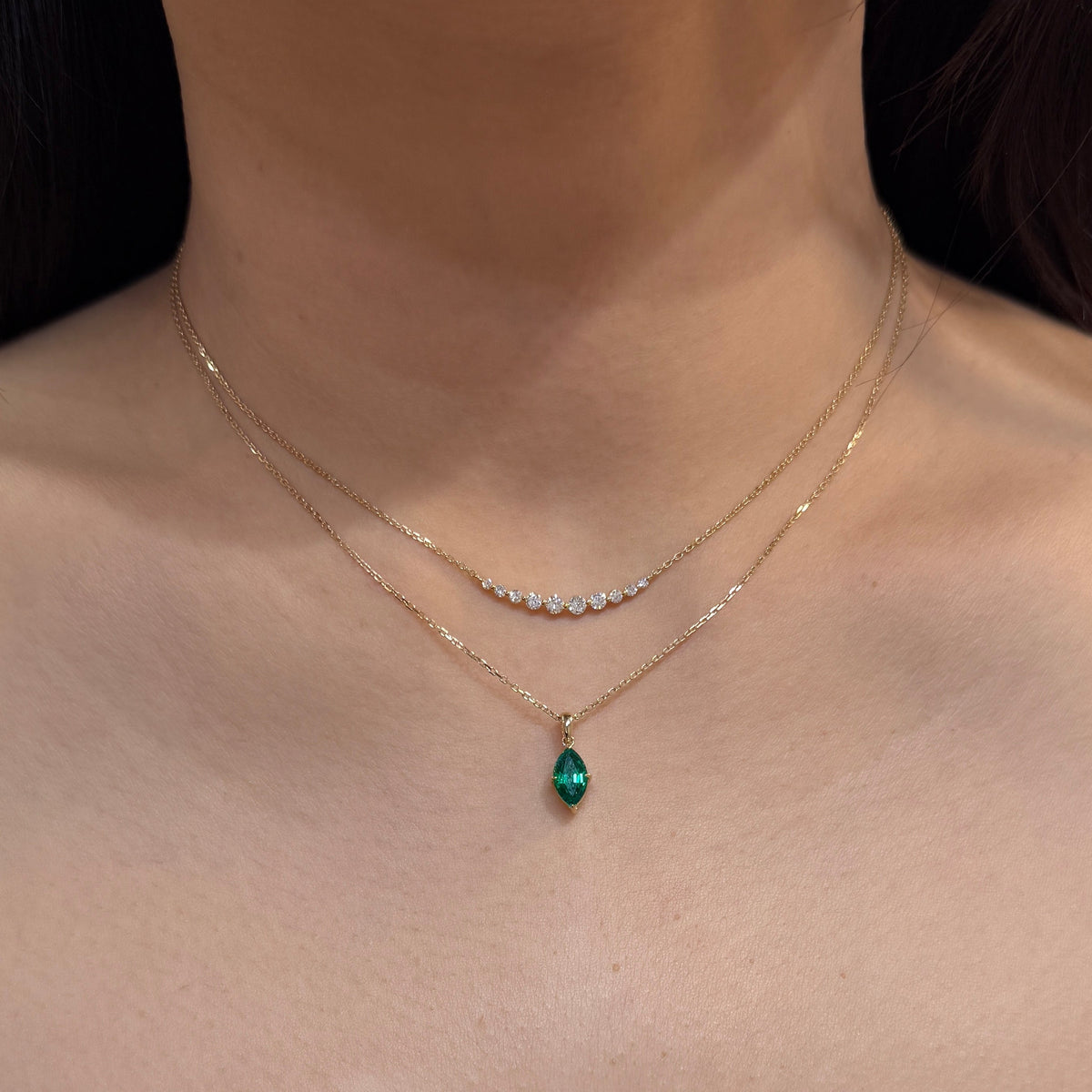 9k Lab emerald green marquise  shape 0.84ct open clip pendant