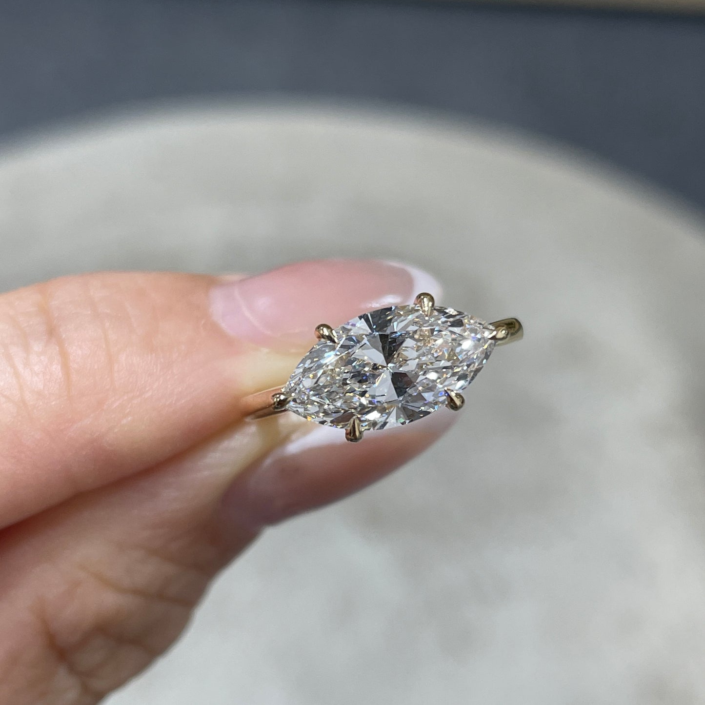 IGI lab diamond marquise shape 2ct four-prong underhalo east west ring