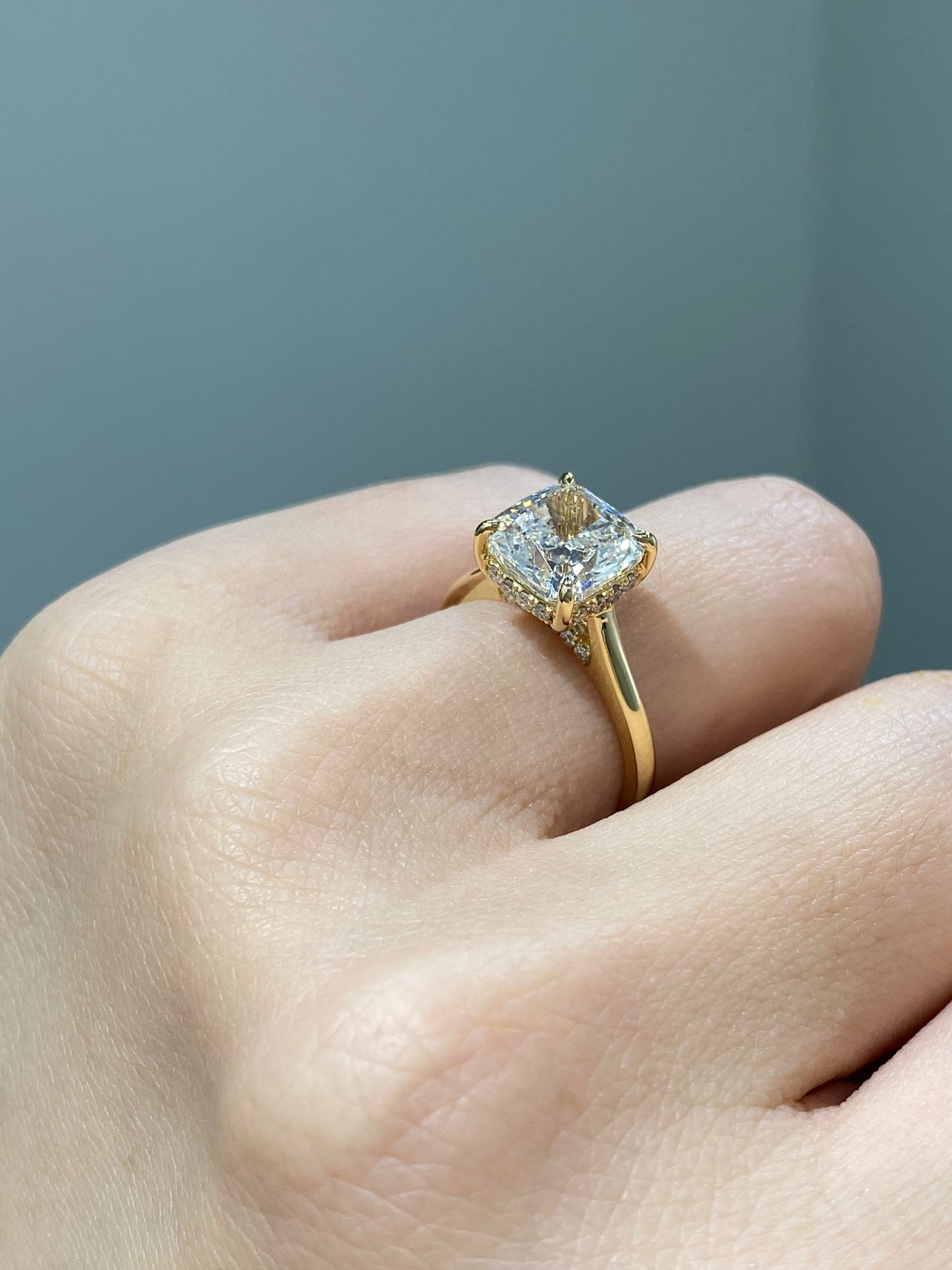 IGI diamond Cushion cut 3ct four-prong underhalo ring