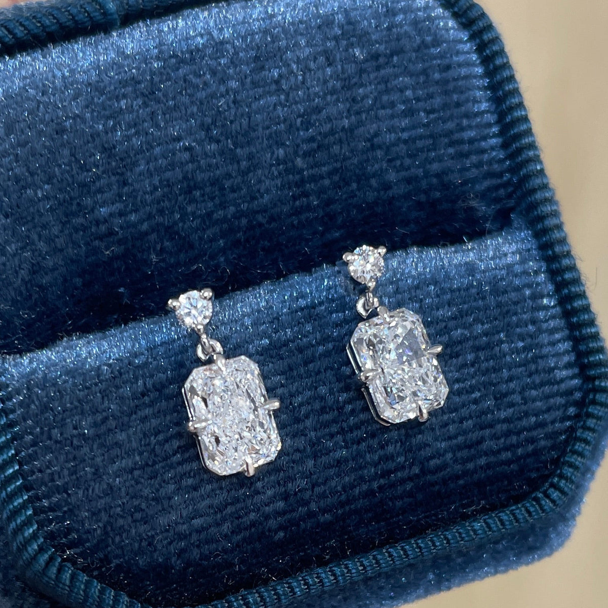 Lab diamond round and radiant cut 2.1ct swing stud earrings-pair
