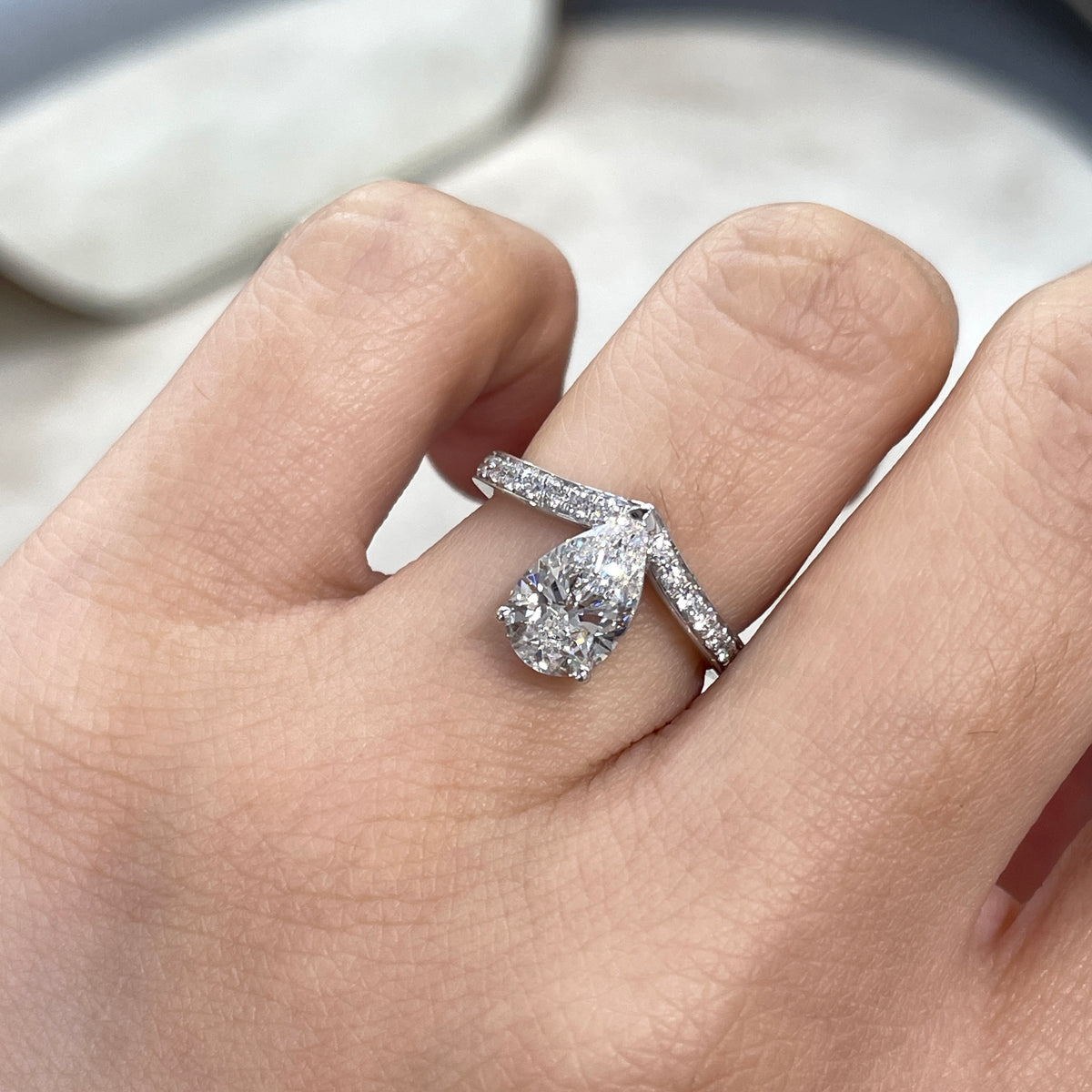 IGI Lab diamond Pear shape 1.5ct v shape channel set ring