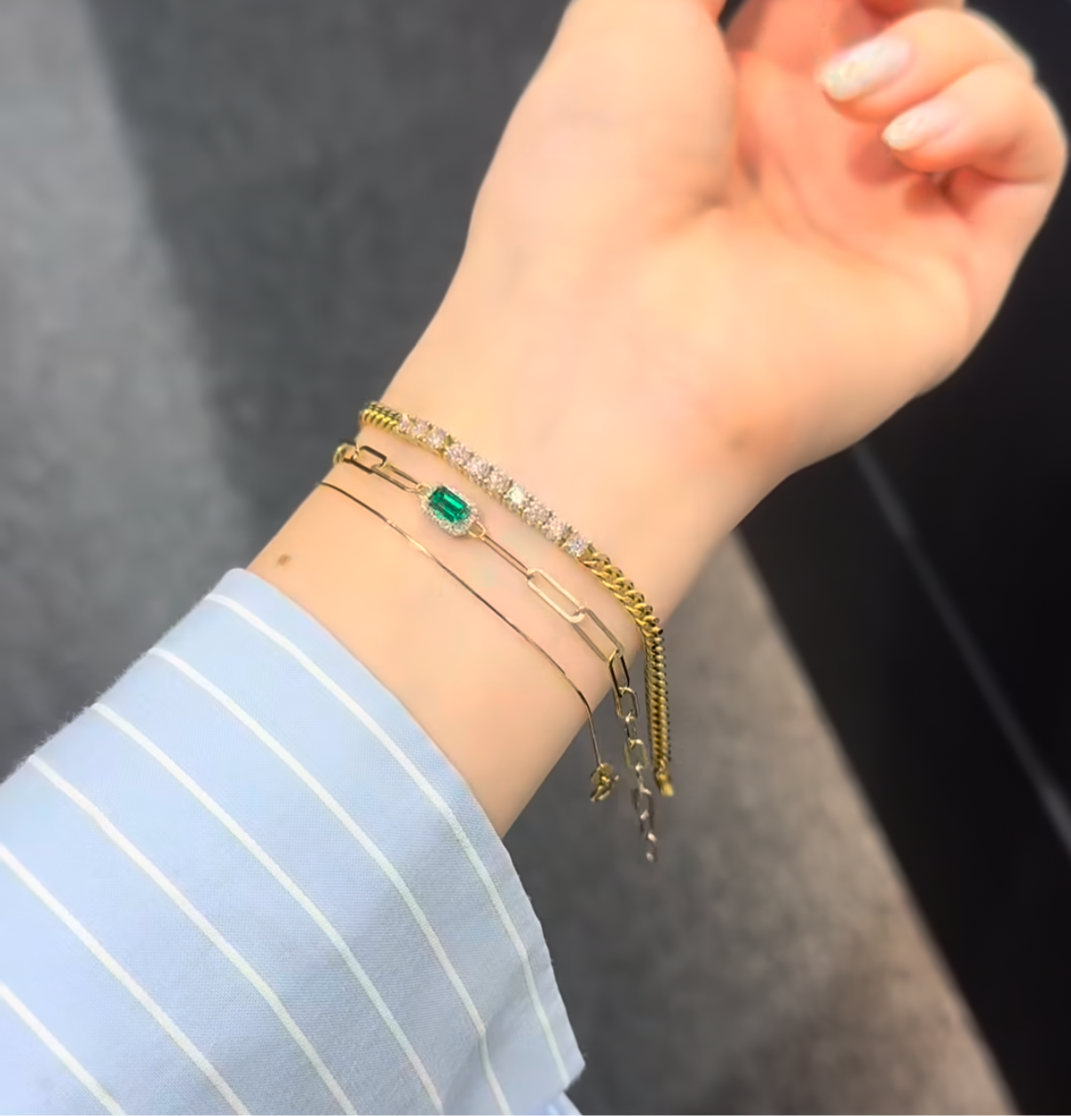 Lab green emerald emerald cut 0.25ct halo with paper clip bracelet