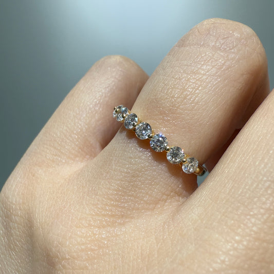 Lab diamond round 0.6ct single prong half eternity ring