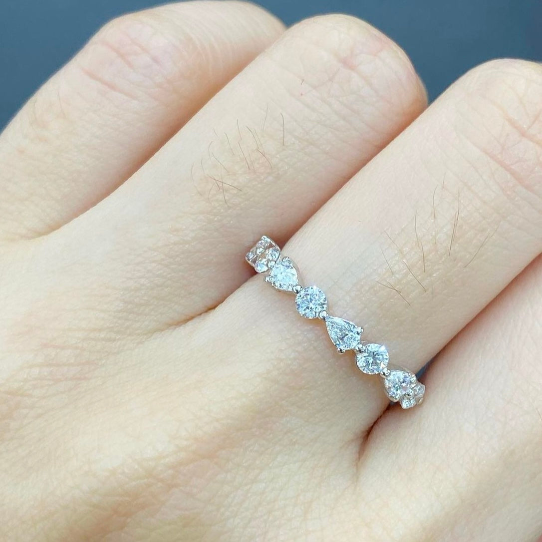 Lab diamond round and pear mix half eternity ring